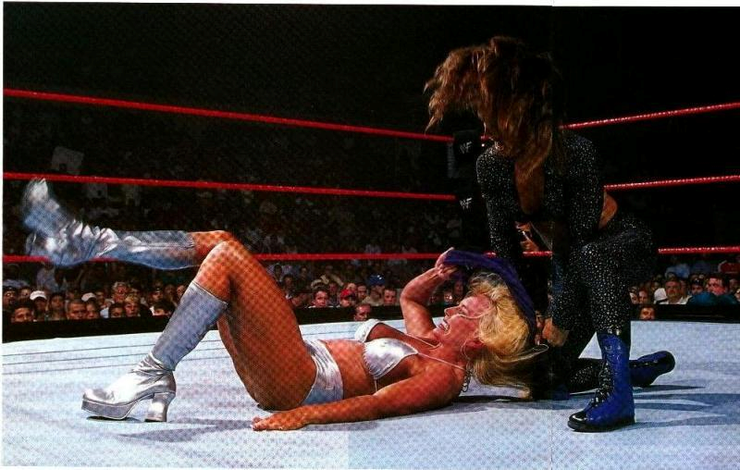 Ella reccomend carmella punk strip falls wrestling